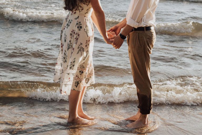 man and women holding hands